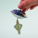 24x Tin toy roundabout with rocket tin spinning top